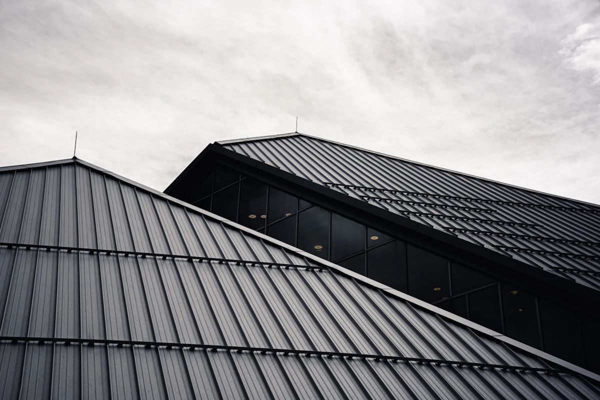 Modern commercial building exterior with low-slope roofing